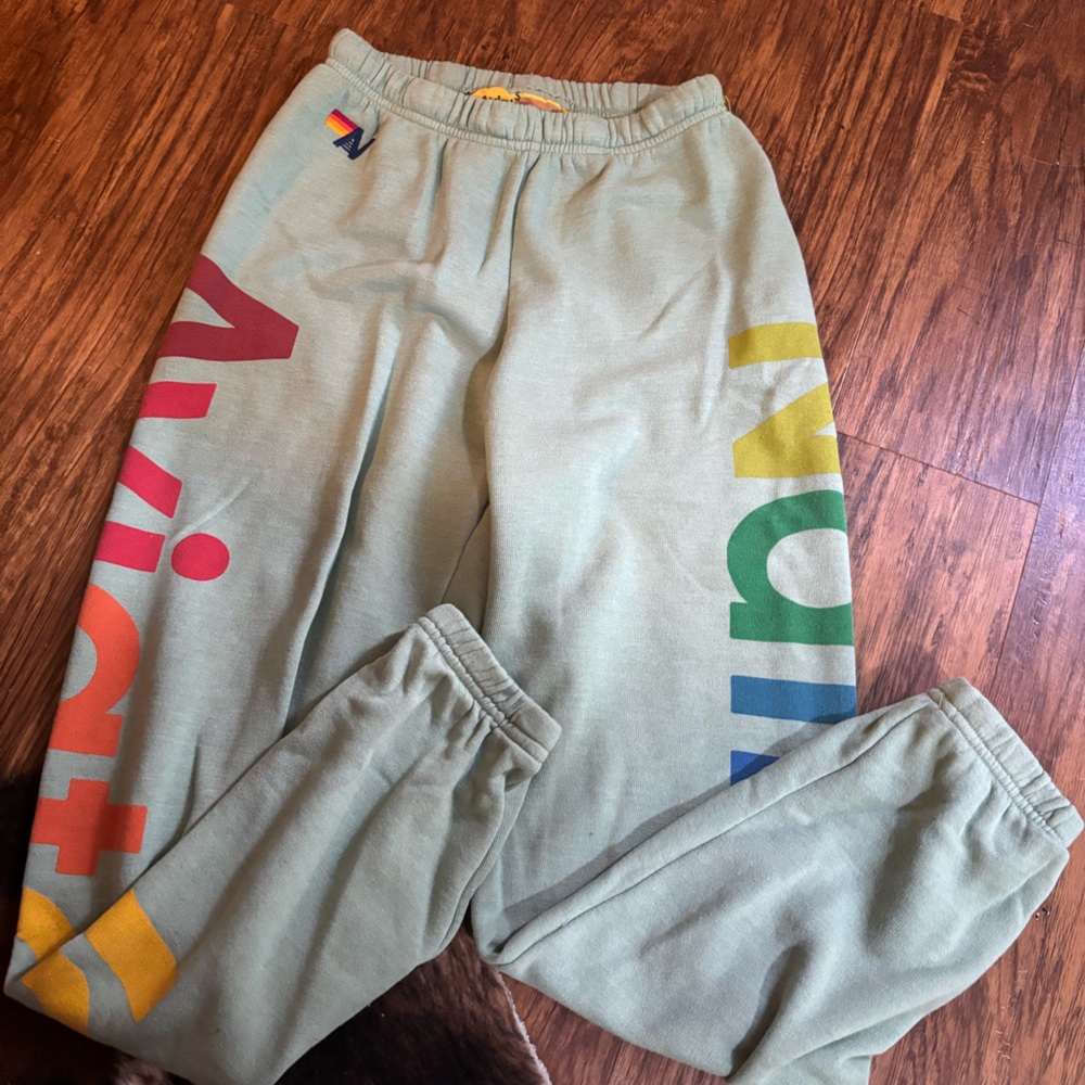 Aviator Nation joggers size small. green with multi color logo